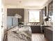 Sleek modern kitchen featuring a large island with marble countertop, modern pendant lights, and stainless steel appliances at 4441 Pompano Se Dr, St Petersburg, FL 33705