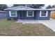 Newly painted home with a front yard at 4614 Webster St, Tampa, FL 33610