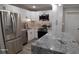 Modern kitchen with white cabinets and granite countertops at 4614 Webster St, Tampa, FL 33610