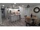 Modern kitchen with white cabinets and granite island at 4614 Webster St, Tampa, FL 33610