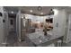 Modern kitchen with white cabinets and granite countertops at 4614 Webster St, Tampa, FL 33610
