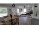 Living area with off-white sectional sofa and wood floors at 4614 Webster St, Tampa, FL 33610