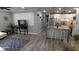 Open concept kitchen with granite island and stainless steel appliances at 4614 Webster St, Tampa, FL 33610