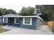 Newly painted home with a driveway at 4614 Webster St, Tampa, FL 33610