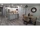 Modern kitchen with white cabinets and granite island at 4614 Webster St, Tampa, FL 33610