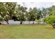 Large backyard with shed and privacy fence at 12408 Noreast Lake Dr, Tampa, FL 33612