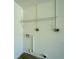 Laundry area with shelving and plumbing hookups at 18138 Lake Worth Blvd, Port Charlotte, FL 33948