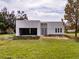 Aerial view of a modern house under construction on a large lot at 19234 Causeway Blvd, Land O Lakes, FL 34638