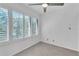 Bright bedroom with large windows and plantation shutters at 3078 Eastland Blvd # 304, Clearwater, FL 33761