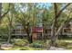 Building exterior surrounded by lush landscaping at 3078 Eastland Blvd # 304, Clearwater, FL 33761