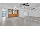 Open living space featuring mirrored walls and tile floors at 3078 Eastland Blvd # 304, Clearwater, FL 33761