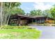 Community clubhouse with covered carport and landscaping at 3078 Eastland Blvd # 304, Clearwater, FL 33761