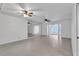 Bright living room with tile floors and multiple ceiling fans at 3078 Eastland Blvd # 304, Clearwater, FL 33761