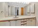 Bathroom with vanity and built-in storage at 3078 Eastland Blvd # 304, Clearwater, FL 33761