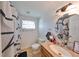 Clean bathroom with granite vanity and updated fixtures at 3207 Acacia St, Lutz, FL 33558