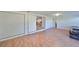 Large bonus room with laminate wood floors and built-in storage at 3207 Acacia St, Lutz, FL 33558
