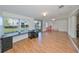 Bright bonus room with laminate wood floors and backyard access at 3207 Acacia St, Lutz, FL 33558