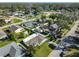 Aerial view showcasing the home's location in a residential neighborhood at 3207 Acacia St, Lutz, FL 33558