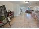 Open living space with tile floors and a comfortable seating area at 3207 Acacia St, Lutz, FL 33558