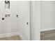 Laundry area with hookups and hexagon tile flooring at 4717 W Mccoy St # 21, Tampa, FL 33616