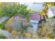 Waterfront property with a private dock and lush green lawn at 52 Sandpiper Rd, Tampa, FL 33609