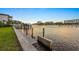 Scenic waterfront view featuring a private dock, calm waters, and convenient access to Tampa Bay at 52 Sandpiper Rd, Tampa, FL 33609