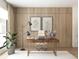 Bright home office featuring a modern desk, stylish decor, and large windows for ample natural light at 7176 S Shore Dr, South Pasadena, FL 33707