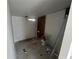 Unfinished bathroom with toilet and plumbing at 9131 Kosimo St, New Port Richey, FL 34654
