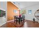 Dining room features hardwood floors and an accent wall at 11701 Colony Lakes Blvd, New Port Richey, FL 34654