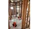Bathroom under renovation with exposed plumbing and flooring at 12520 4Th E St, Treasure Island, FL 33706