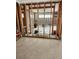Unfinished basement with exposed framing and flooring at 12520 4Th E St, Treasure Island, FL 33706