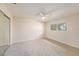 Spacious bedroom with carpet flooring and a mirrored closet at 13811 Shady Shores Dr, Tampa, FL 33613