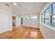 Charming bedroom with hardwood floors, stained glass window and two closets at 13811 Shady Shores Dr, Tampa, FL 33613