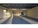 Spacious garage with epoxy flooring at 13811 Shady Shores Dr, Tampa, FL 33613