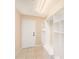 Convenient mud room with built-in cubbies, bench, and tile flooring at 13811 Shady Shores Dr, Tampa, FL 33613