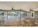 Large screened-in pool and spa area with a spacious patio at 13811 Shady Shores Dr, Tampa, FL 33613