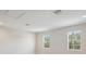 Large bonus room offers versatile space, with recessed lighting at 35298 Big Hawk Dr, Zephyrhills, FL 33541
