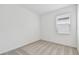 Well-lit bedroom featuring neutral carpet and a window providing natural light at 9434 Shorebird Ct, Parrish, FL 34219