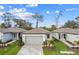 Charming single-story home with well-manicured landscaping and an attached two-car garage at 9434 Shorebird Ct, Parrish, FL 34219