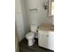 Clean bathroom with toilet and vanity at 12501 Ulmerton Rd # 119, Largo, FL 33774