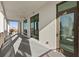 A condo balcony with tile floors and exterior door and windows at 126 4Th Ne Ave # 1302, St Petersburg, FL 33701