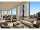 Spacious balcony featuring comfortable seating areas and panoramic city and ocean views at 126 4Th Ne Ave # 1302, St Petersburg, FL 33701