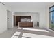 Modern kitchen featuring sleek cabinetry, a center island, and plenty of natural light at 126 4Th Ne Ave # 1302, St Petersburg, FL 33701