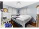 Bright bedroom with a double bed and ample closet space at 225 35Th N St, St Petersburg, FL 33713