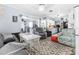 Open living area with views into the kitchen and dining area at 225 35Th N St, St Petersburg, FL 33713