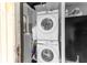 Stackable Samsung washer and dryer in a compact laundry room at 225 35Th N St, St Petersburg, FL 33713