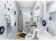Small bathroom with shower and white vanity at 225 35Th N St, St Petersburg, FL 33713