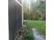 Landscaped backyard with privacy and wooded area at 3161 Lake Pine S Way # B1, Tarpon Springs, FL 34688