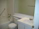Bathroom with bathtub, toilet, and vanity at 3161 Lake Pine S Way # B1, Tarpon Springs, FL 34688