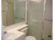 Clean bathroom with a shower and vanity at 3161 Lake Pine S Way # B1, Tarpon Springs, FL 34688